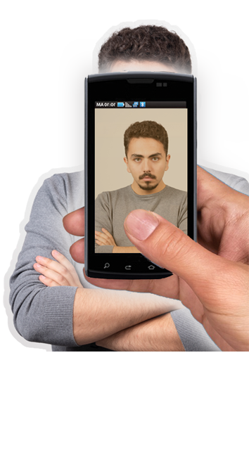 Image showing security person clicking visitors pic at entrance